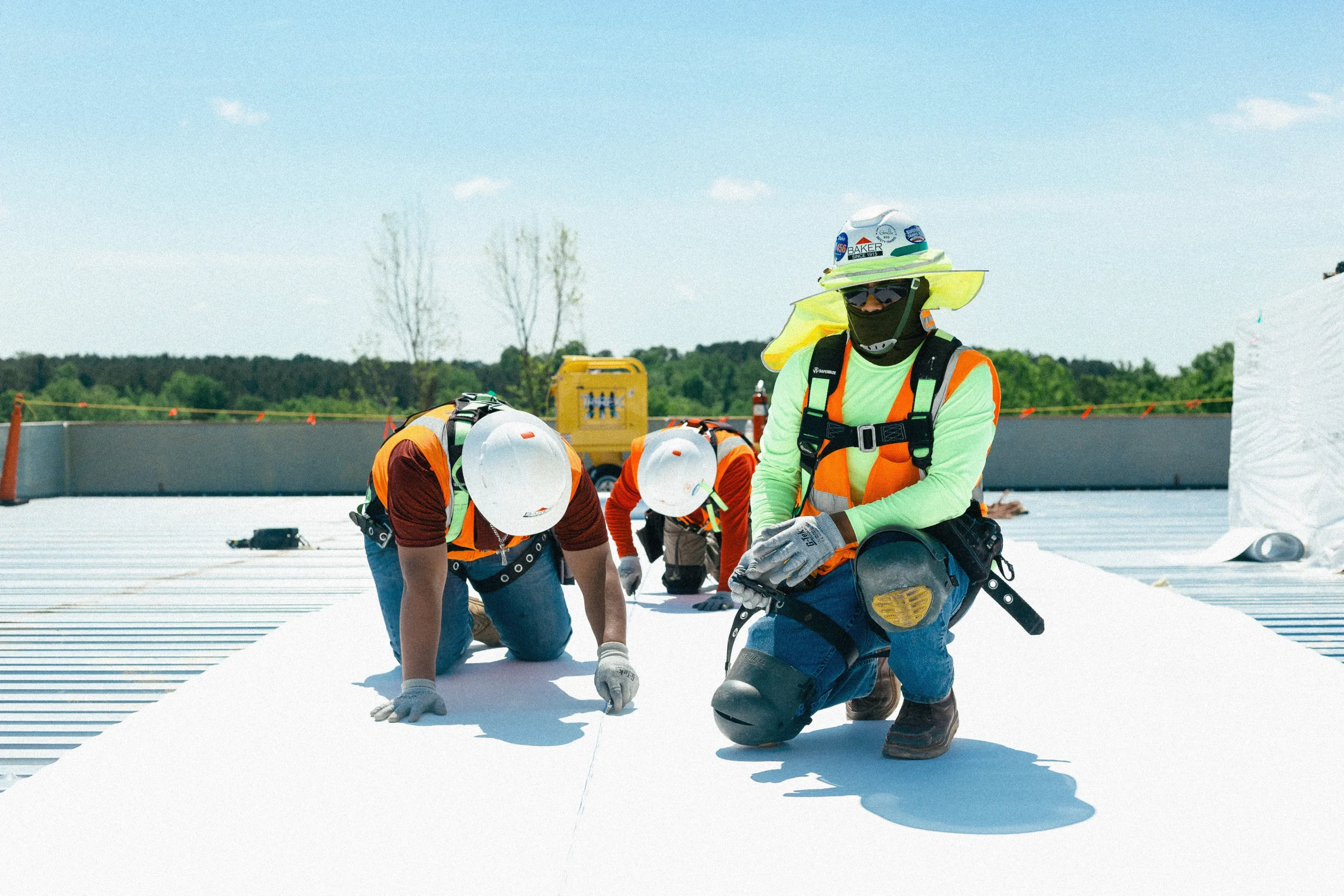 Baker crew on a commercial roof