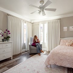 Bedroom with white drapes