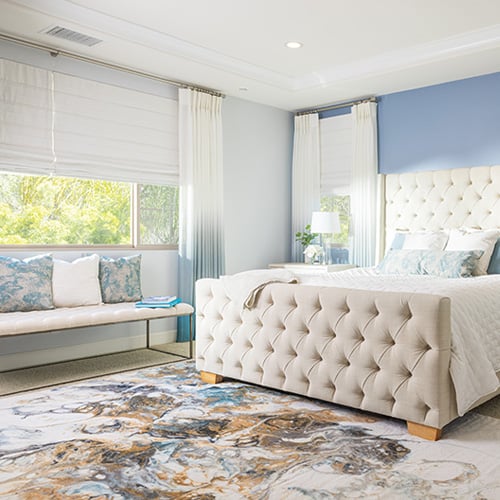 Bedroom with shades and drapes