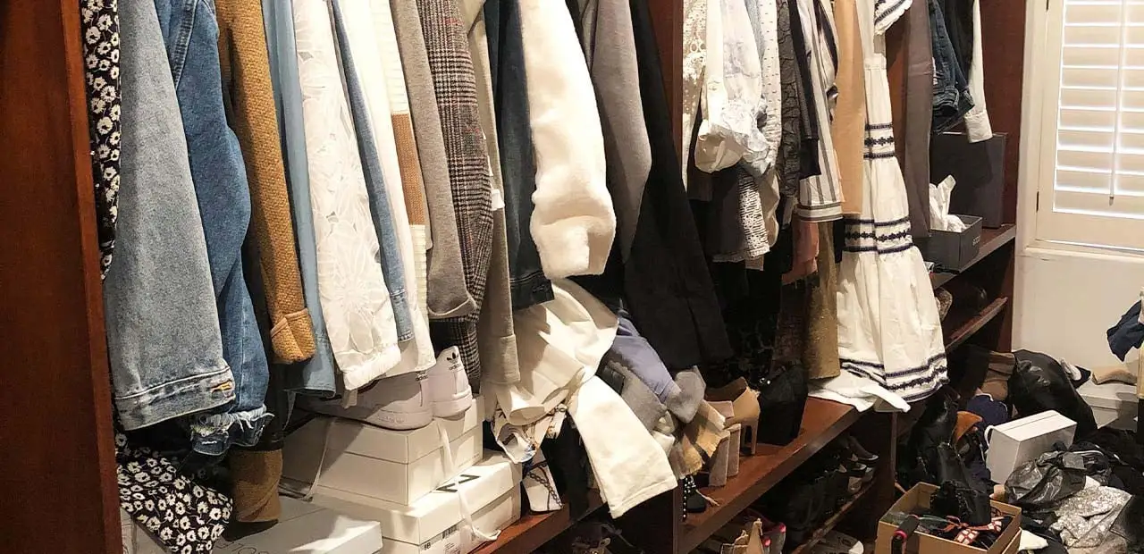 Cluttered coat rack before installation