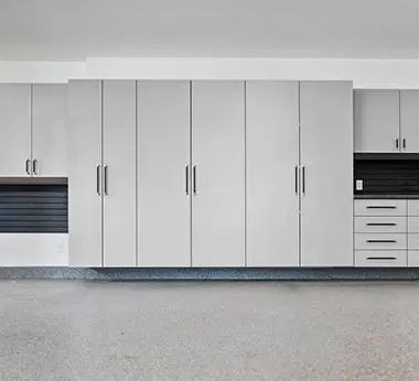 Light grey cabinets with black slatwall
