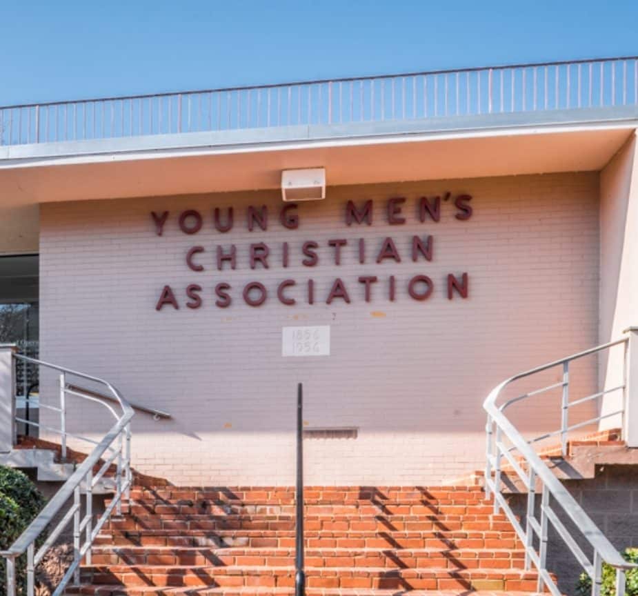 a building with downtown ymca sign on the side