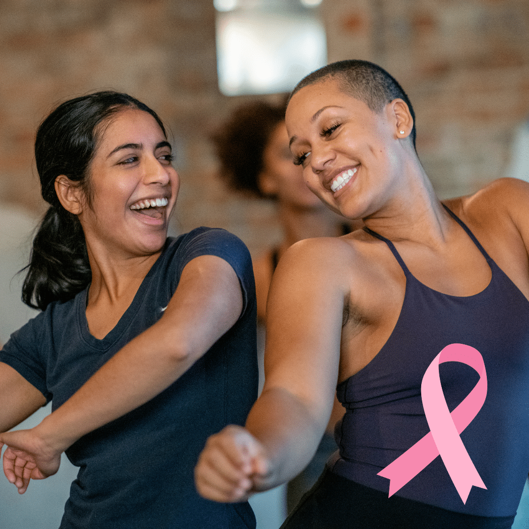 Two women dancing in a studio.