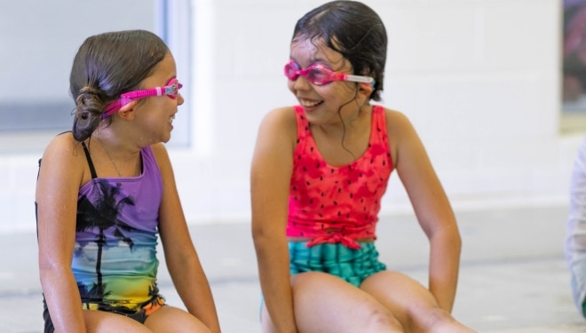 a group of girls wearing goggles