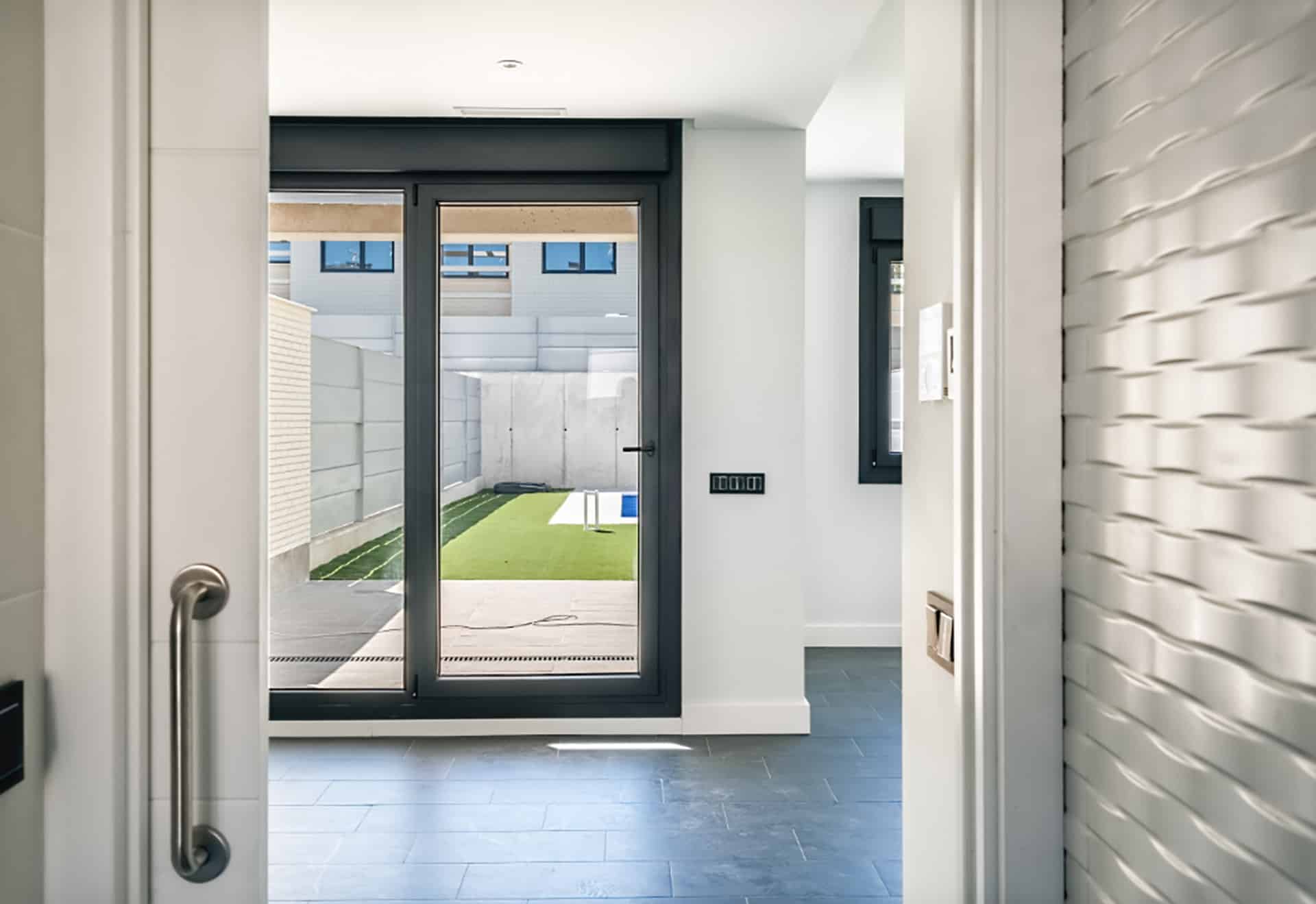 Patio door with backyard view